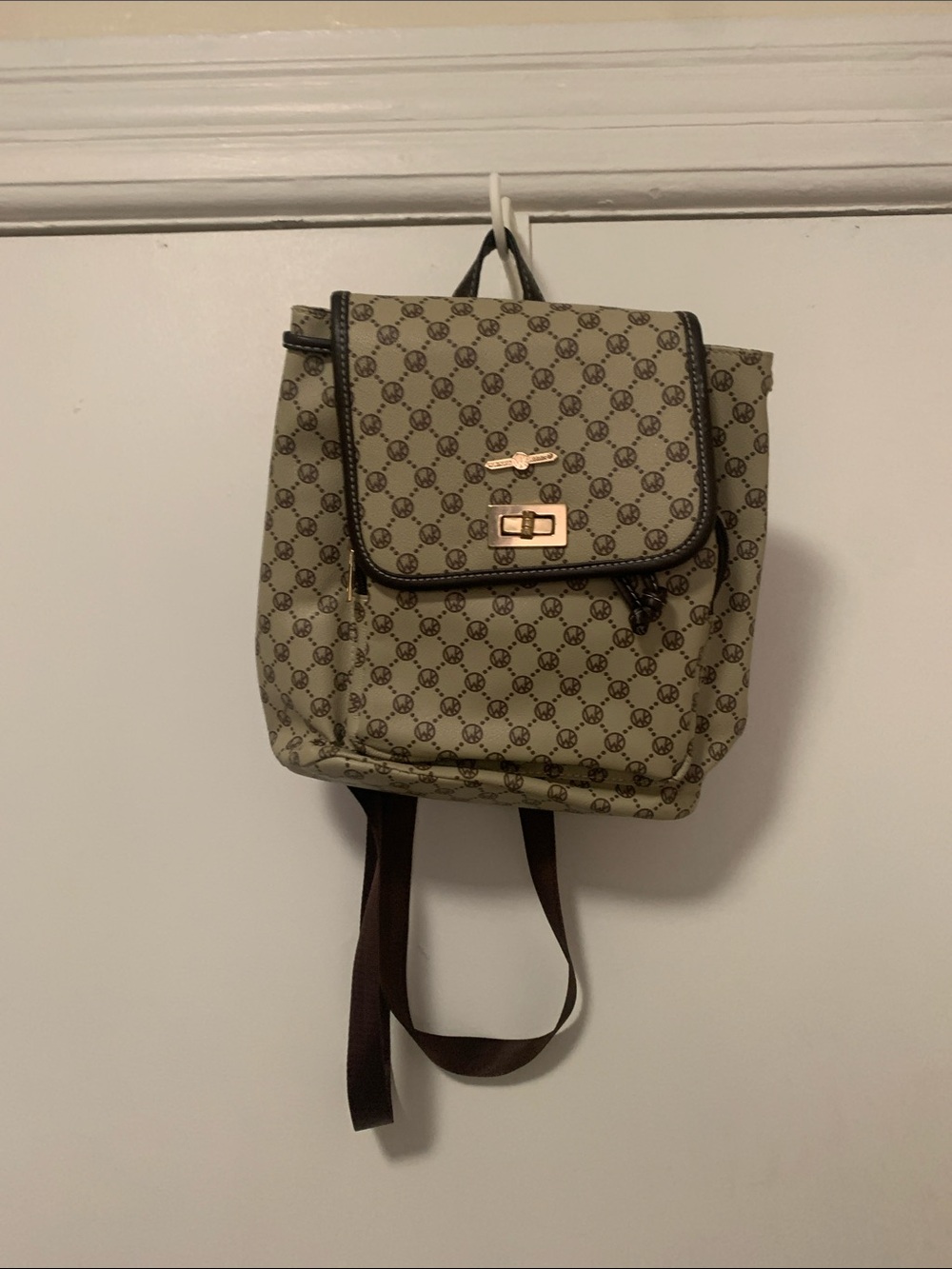 Beige Patterned Backpack with Gold-Tone Hardware